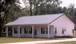 A covered porch is a popular feature on steel houses